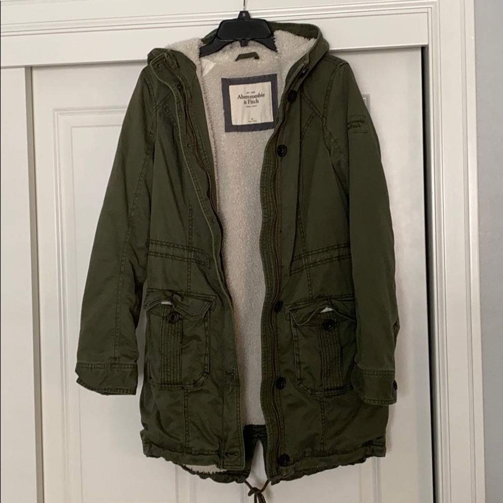 Olive green furry lined winter coat.